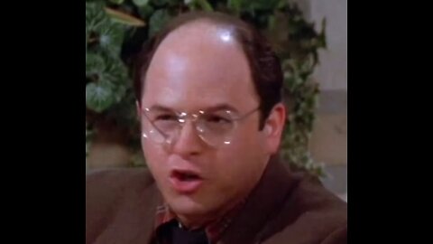Seinfeld: George looks annoyed to pretend he is busy