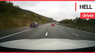 Shocking video shows ‘crazy’ motorist undertaking lorry at 100mph
