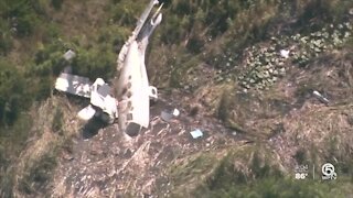 Plane with 7 onboard crashes at North Palm Beach County General Aviation Airport