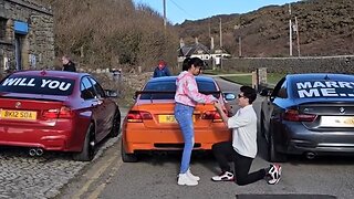 Creative guy proposes to girlfriend with BMW cars
