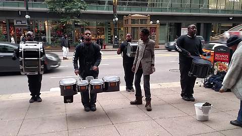 Amazing drumline gets help from surprise backup dancers