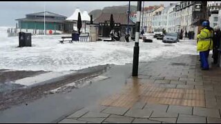 Storm Brian floods British streets