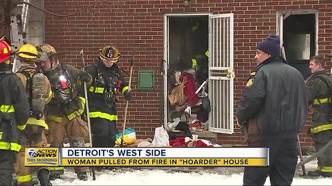 Woman pulled from fire in 'hoarder house' in Detroit