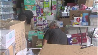 Volunteers collect donations at Witham Field in Stuart for Hurricane Dorian victims