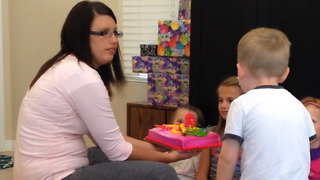 A Little Boy Slaps A Birthday Girl In The Face