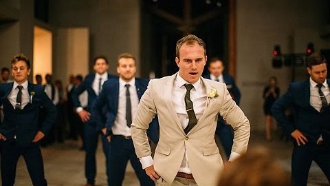 Groom Surprises Bride With Epic Groomsmen Dance