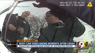 Body camera video shows moments after truck hit police car