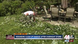 Neighbors clean up damage after overnight storm