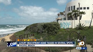 Beachfront home tagged with graffiti