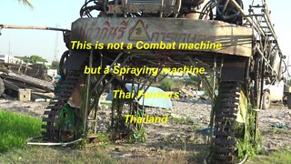 Thai Farmers this is not a combat machine but spraying machine in Thailand