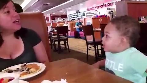 An Adorable Tot Doesn't Let A Woman Speak