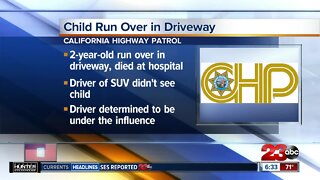 Child run over in driveway, driver determined to be under the influence