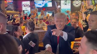 Trump Hands Out Free Pizza To An Excited Crowd