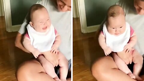 Funny Baby Laughing Out Loud Because of Puppy
