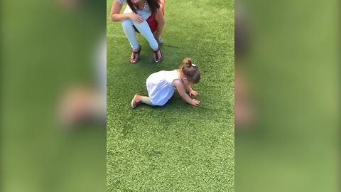Dizzy Tot Girl Struggles To Stand Up