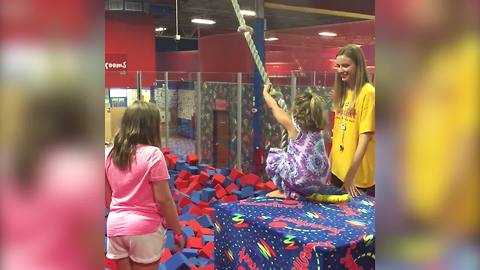 A Tot Girl Falls Into A Foam Pit Face Down