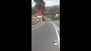WATCH: Shock of witnesses as grieving man jumps into flames of truck after crash (MYG)