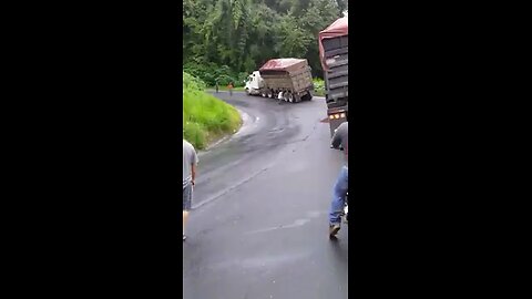 TRUCK OVER TURNS ON CAMERA