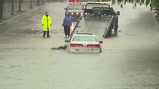 Crews retrieve car from Westport flood waters