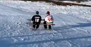 Lazy guys use picnic table to ski