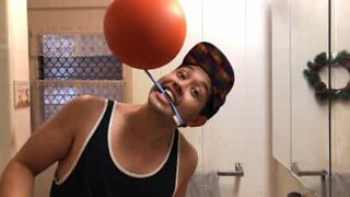 Freestyler spins ball on toothbrush and ukulele