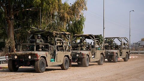 Israeli troops assemble on Gaza border for possible ground assault