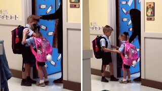 Big Brother Gives His Sister A Comforting Hug Before School