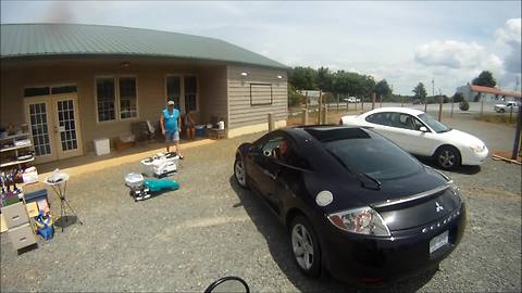 Watch Motorcyclist Handle a Careless Driver Like a Boss