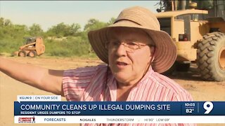 Community frustrated with illegal dumping site gathers to clean up
