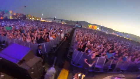 Fan's GoPro ends up in musician's hands during performance at Coachella