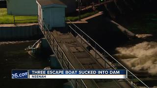 three people escape Neenah dam when boat gets stuck