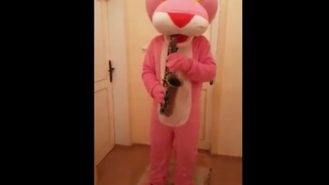 Pink Panther plays his own theme song on saxophone