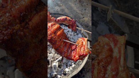 Rotisserie spare ribs with a maple sriracha sauce