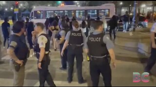 Hundreds of teens flood Chicago, smashing car windows, firing shots