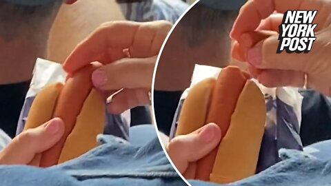 Australian Open fan causes social media stir with hot dog act