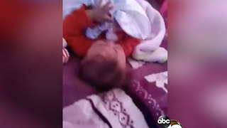 Police looking into Facebook video showing baby being slapped