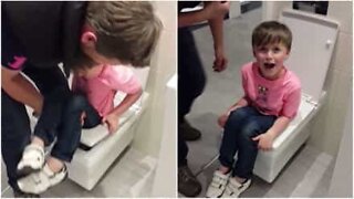 Boy gets stuck in a display toilet!
