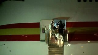 American Evacuees Disembarking Plane From Wuhan, China