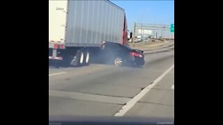 Driver Waves For Help As Car Is DRAGGED By A Semi-Truck