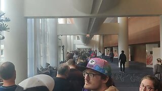 Waiting in line to get in.