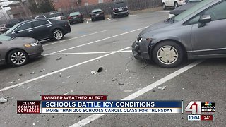 Metro schools battle icy parking lots, cancel school