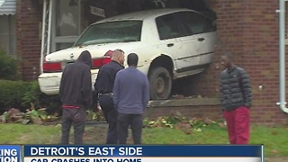 Car crashes into home