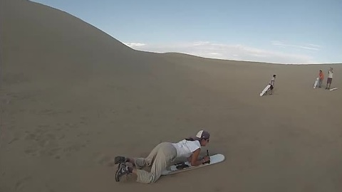 Sandboarding in the Huacachina desert