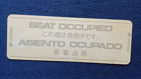 SHOW AND TELL 136: UNITED Airlines, SEAT OCCUPIED, Multi-Lingual Placard, early 1980s.