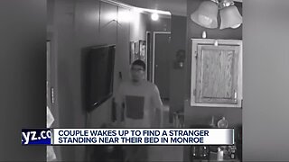 Couple wakes up to find a stranger standing near their bed in Monroe