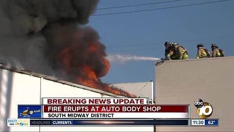Fire destroys auto body shop near Lindbergh Field