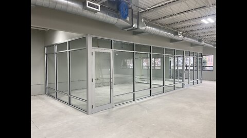 Time lapse Interior office space glass enclosure