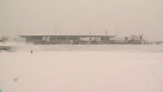 Airport crews working hard to clear runways