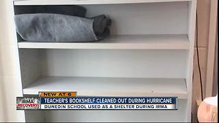 Teacher's bookshelf cleaned out during Hurricane