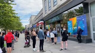 Shoppers queue for hours as store reopens in the UK